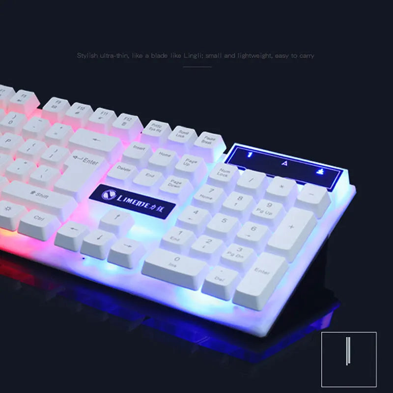 GTX300 black and white wired USB gaming keyboard and mouse set with backlit keys on a desk