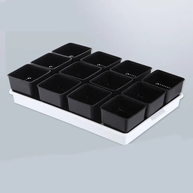 Black and white modular resin flower pots and tray for succulents and home gardening.