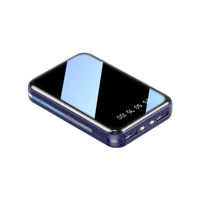 Mini digital display power bank in plastic shell showing capacity readout.