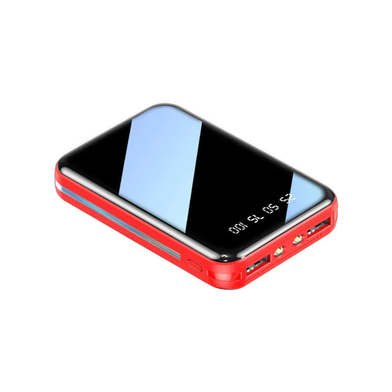 Mini digital display power bank in plastic shell showing capacity readout.
