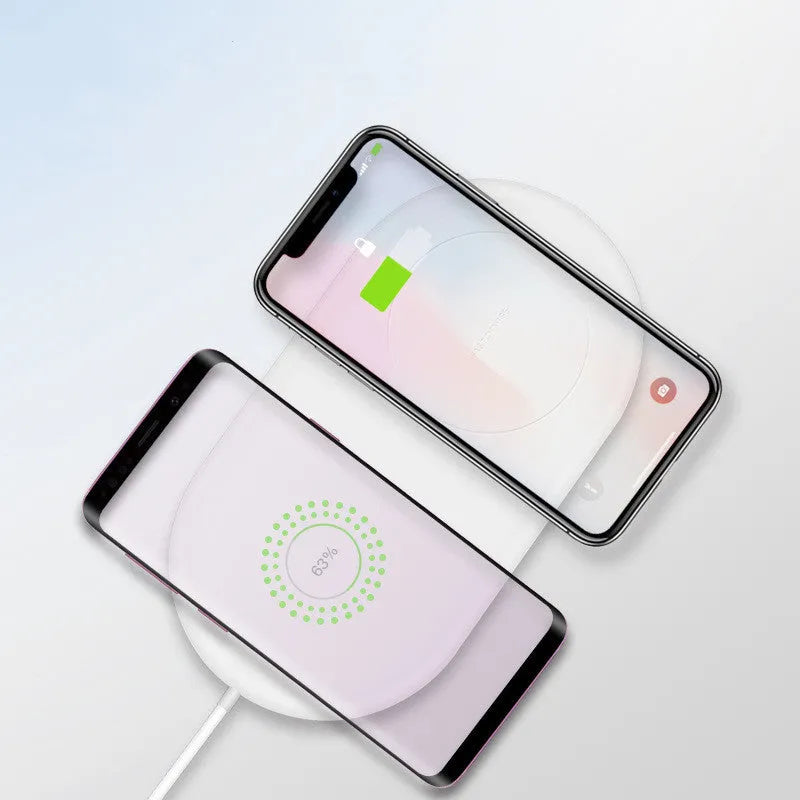 White dual-port wireless charger for two mobile phones with minimalist design