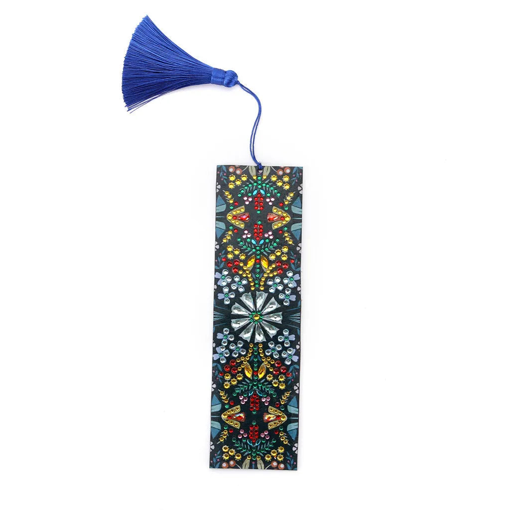 Handcrafted leather bookmark with a diamond-embroidered mandala flower design.