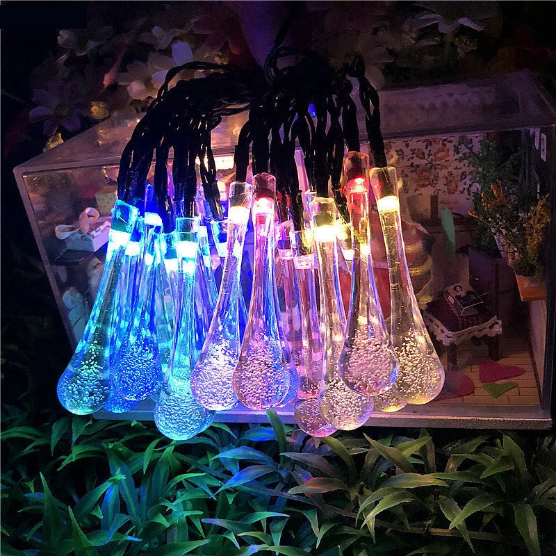 Solar-powered LED water drops string lights with 30 bulbs on 6.5 metre waterproof cable for outdoor garden use
