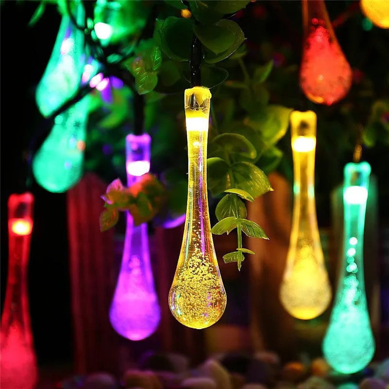 Solar-powered LED water drops string lights with 30 bulbs on 6.5 metre waterproof cable for outdoor garden use