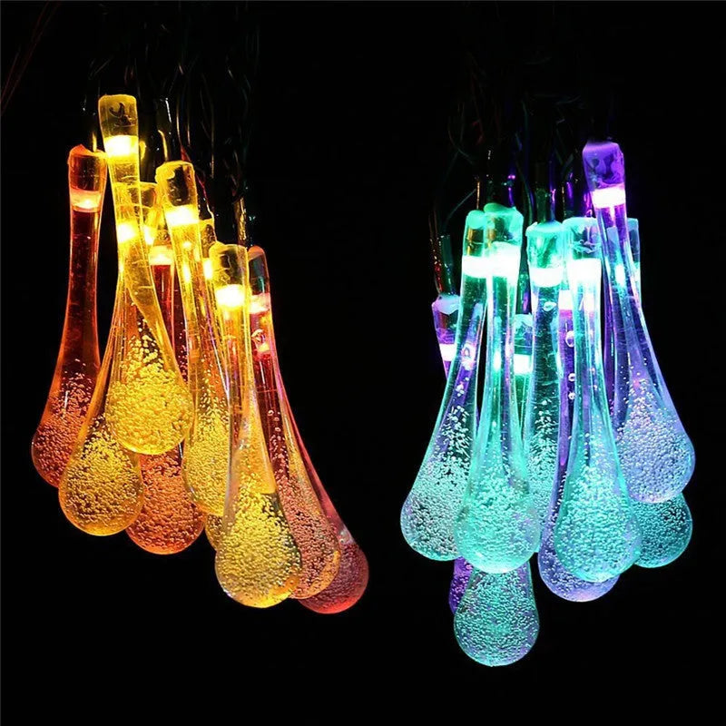 Solar-powered LED water drops string lights with 30 bulbs on 6.5 metre waterproof cable for outdoor garden use