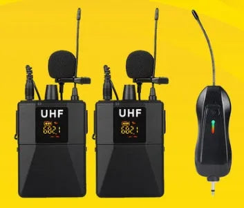 Black Little Bee wireless lavalier microphone clipped to a shirt collar next to its receiver.