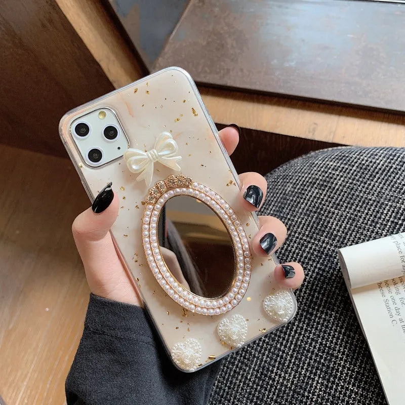 Brown marble patterned iPhone case with bowknot rhinestone design and mirror detail