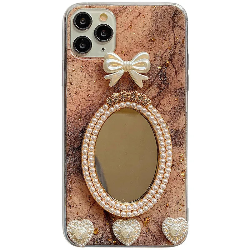 Brown marble patterned iPhone case with bowknot rhinestone design and mirror detail