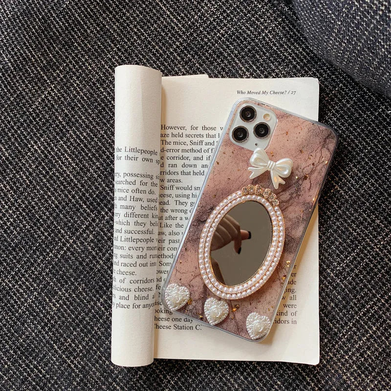Brown marble patterned iPhone case with bowknot rhinestone design and mirror detail