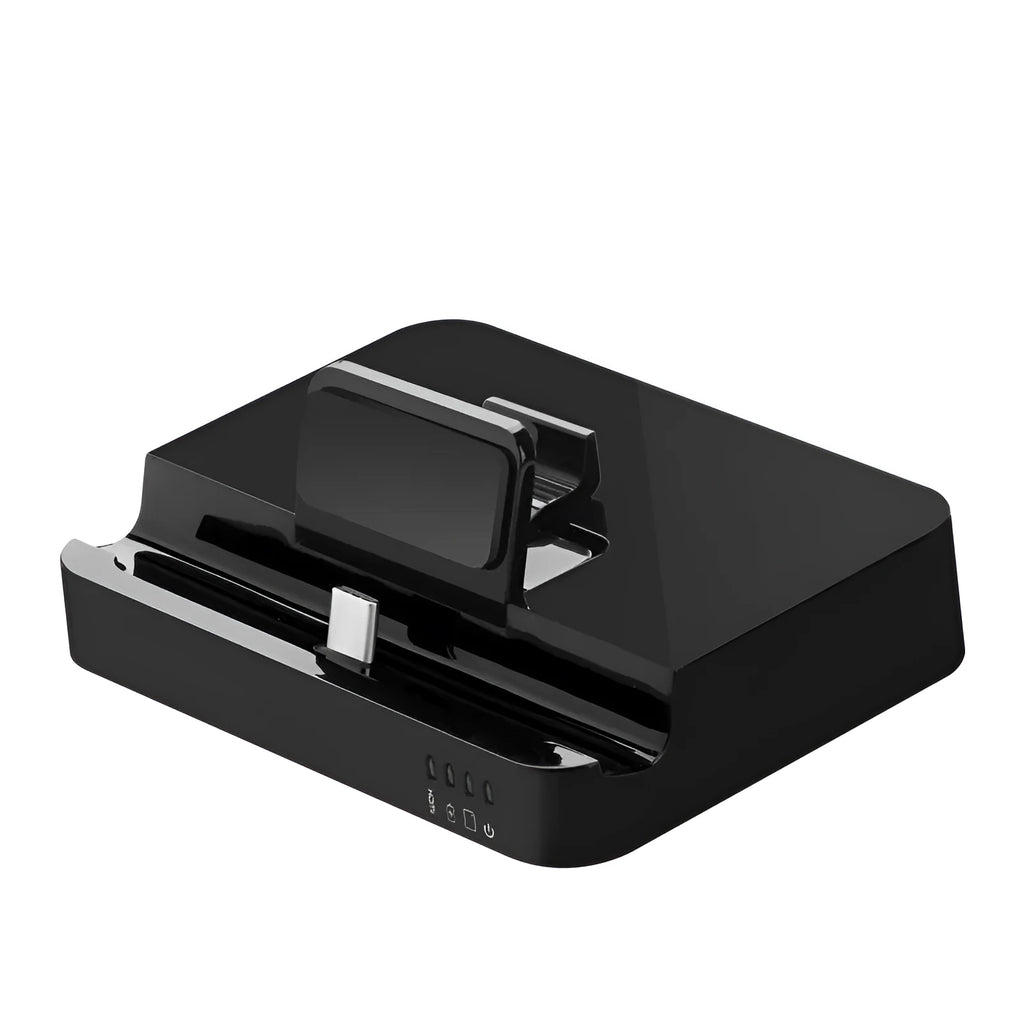 Black aluminium mobile phone dock converter for USB-C to HDMI connection on a desk.