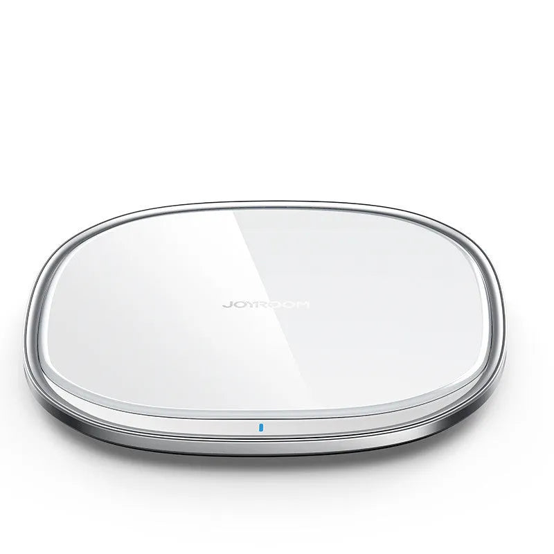 Black wireless phone charger with glass surface showing charging indicator light