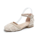 Women's apricot suede D'Orsay flats with an ankle strap and low block heel.