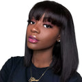 Black 10-inch real human hair wig on a stand showing short to medium length style.