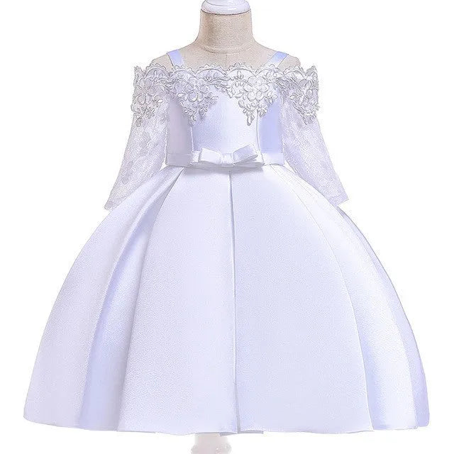 Simple girls' lace-trimmed dress in polyester, shown in red, on a hanger.
