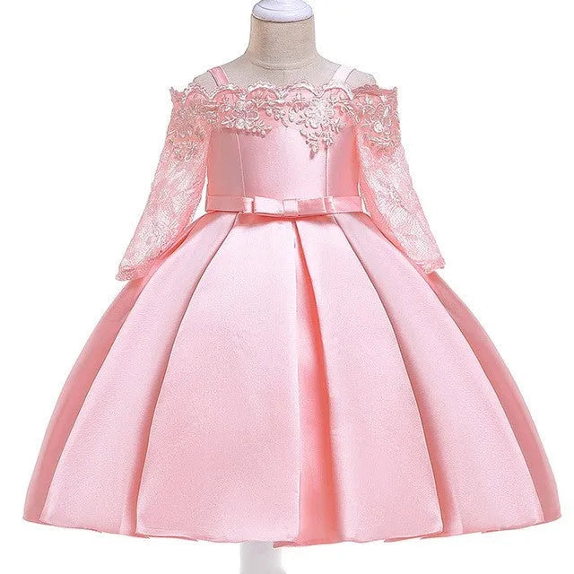 Simple girls' lace-trimmed dress in polyester, shown in red, on a hanger.