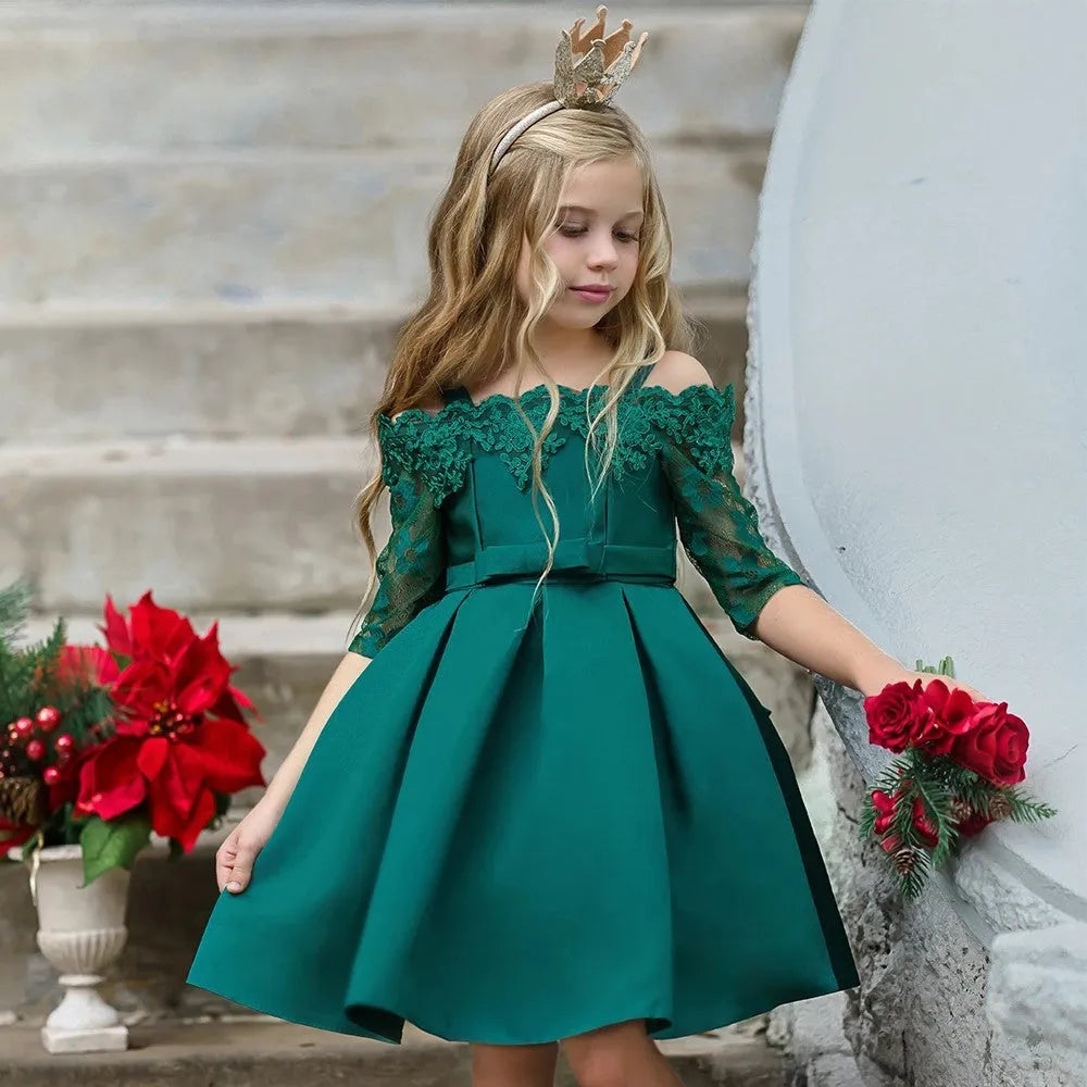 Simple girls' lace-trimmed dress in polyester, shown in red, on a hanger.