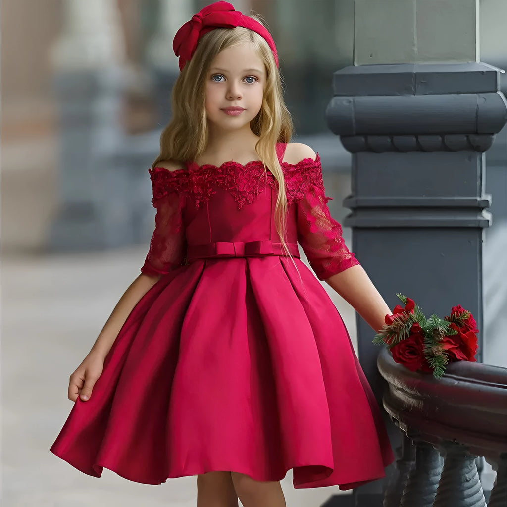Simple girls' lace-trimmed dress in polyester, shown in red, on a hanger.
