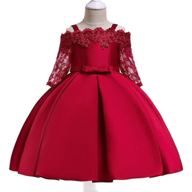Simple girls' lace-trimmed dress in polyester, shown in red, on a hanger.