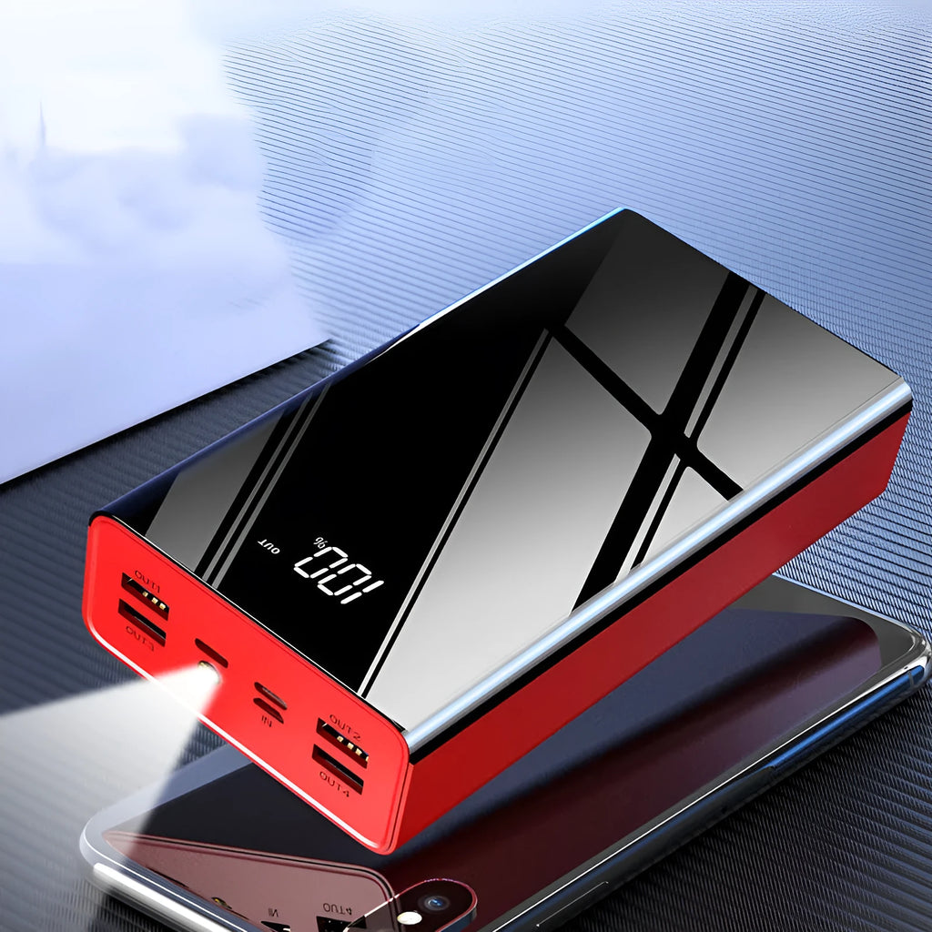 Large black or red 40000 mAh power bank with LCD display showing charge percentage.