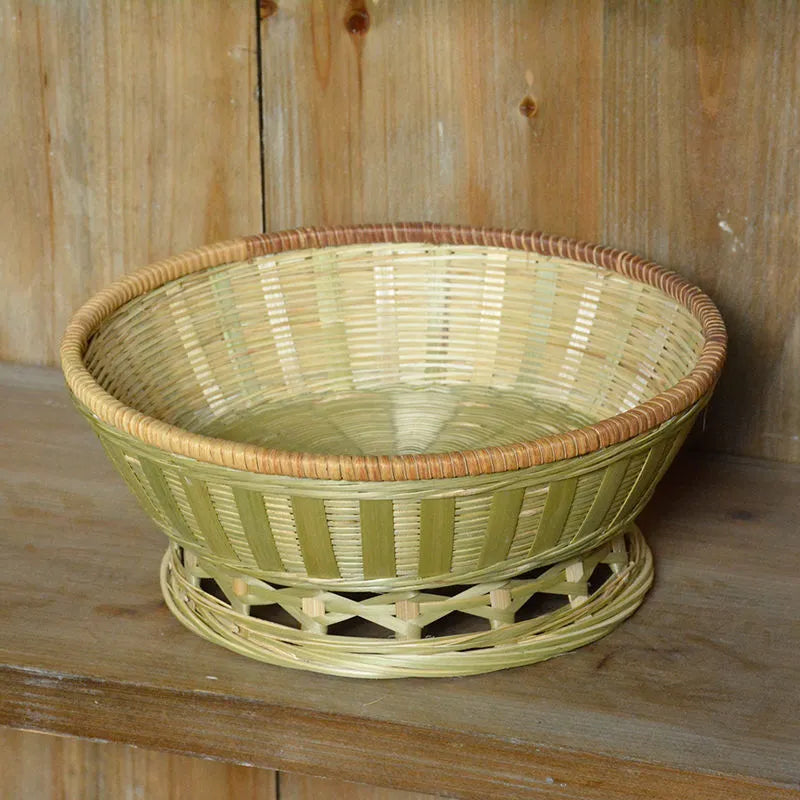 Handmade natural bamboo storage basket in woven construction showing three size options