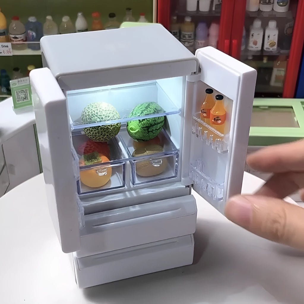 White plastic miniature candy toy model with lighting feature showing detailed candy design