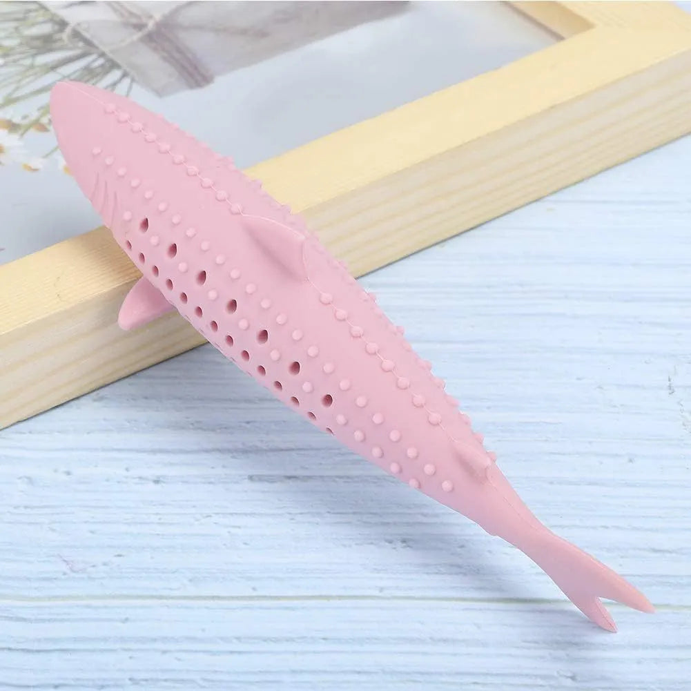 Green silicone fish-shaped chew toy for cats on a white background, showing side breathable holes.