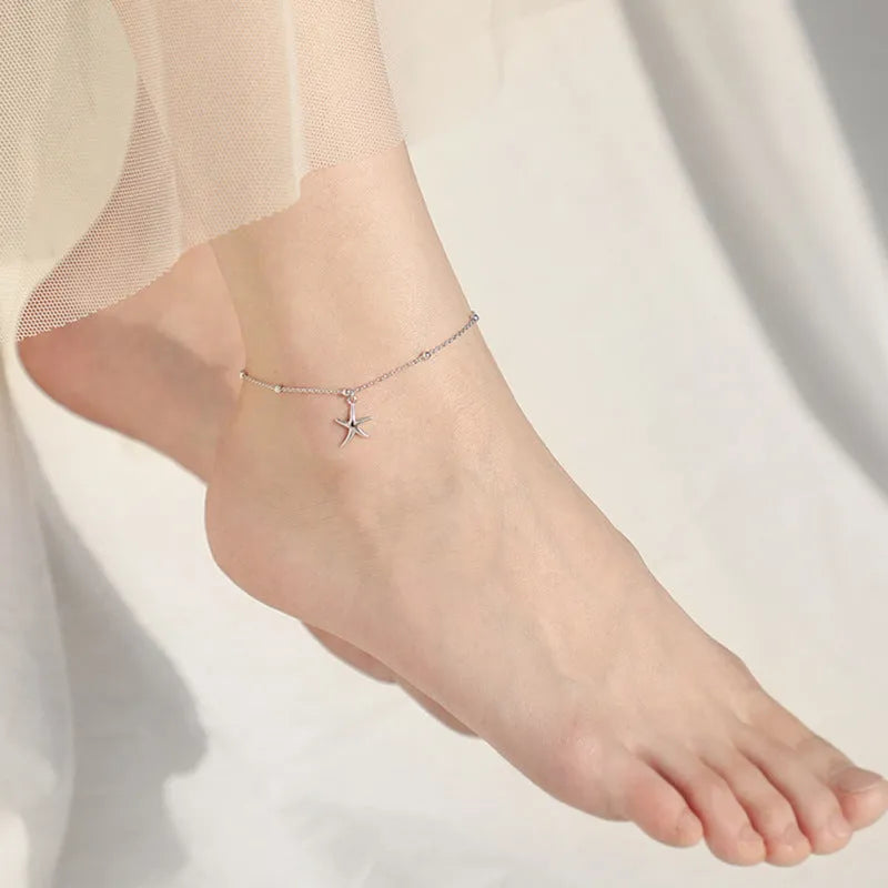 S925 sterling silver anklet with a starfish charm on a round bead chain.
