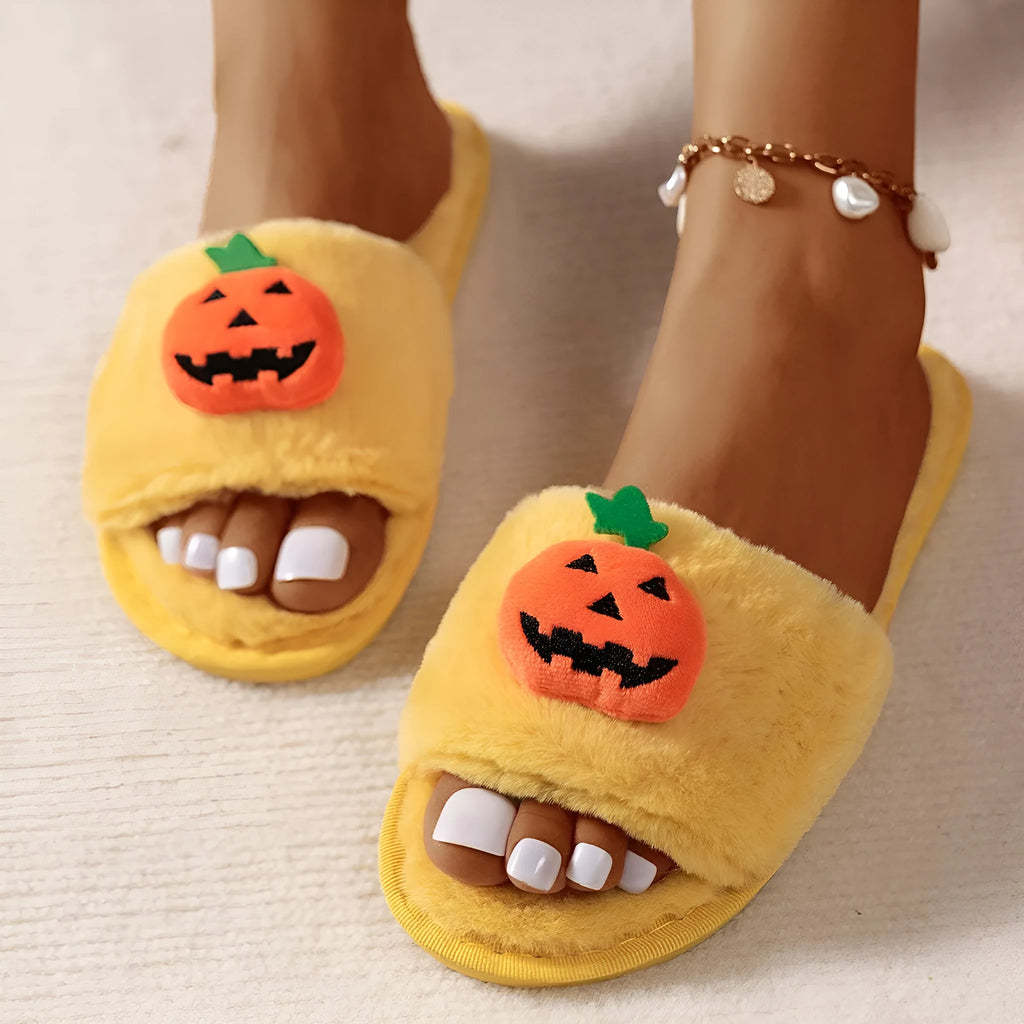 Pumpkin-themed plush slippers with synthetic fur upper and anti-slip PVC sole