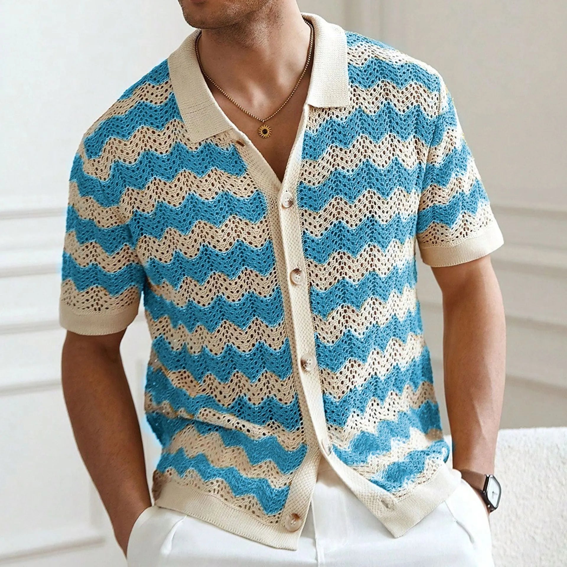 Short-sleeved yellow hollow jacquard corrugated sweater with flocked detail on a mannequin.