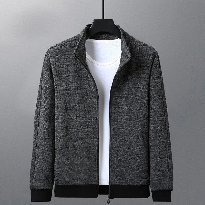 Men's black fitted casual jacket with a stand-up collar and zip front.