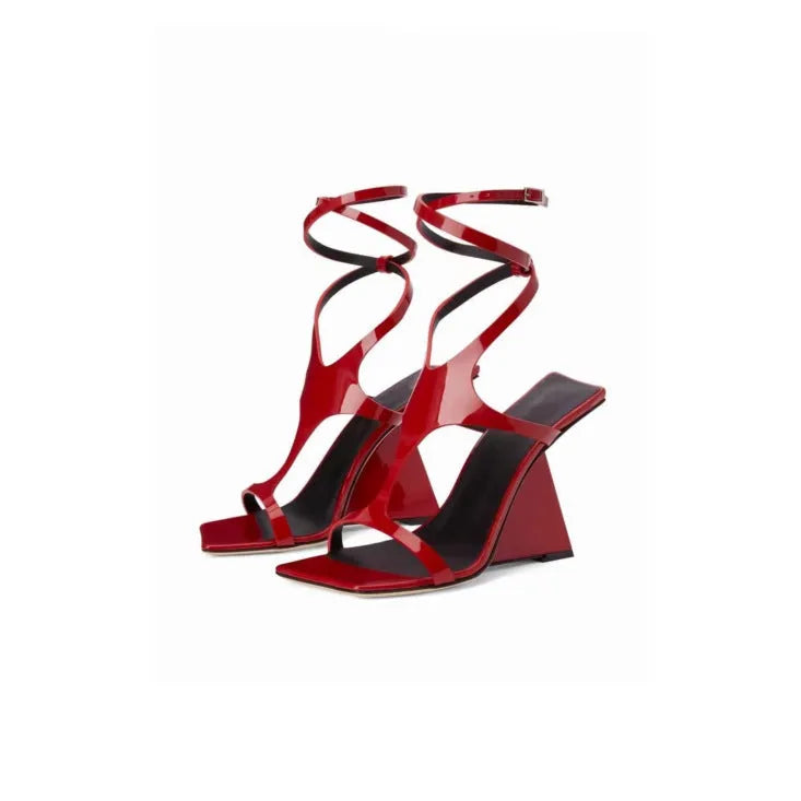 Women's black high heel sandals with a square toe and adjustable ankle buckle on a 9.5cm block heel.