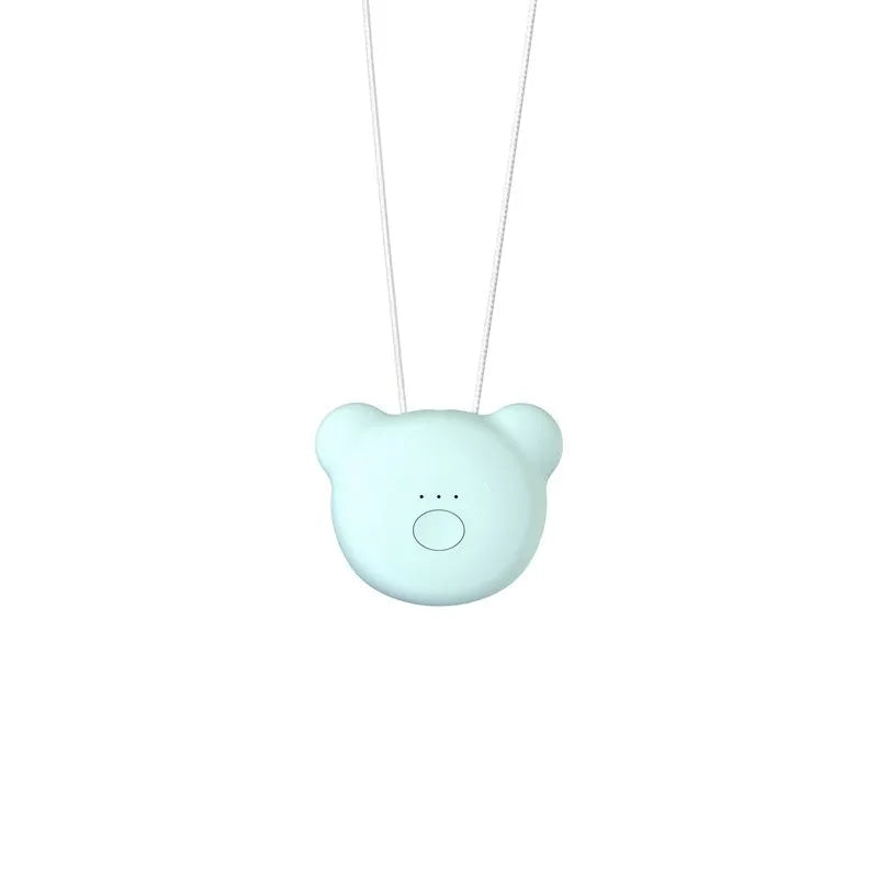 Mini USB air purifier necklace in pink showing compact wearable design with one-button control
