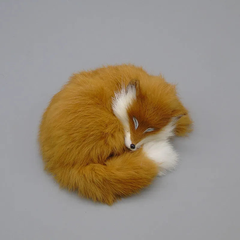 Artificial white fox fur car decoration handicraft on a dashboard.