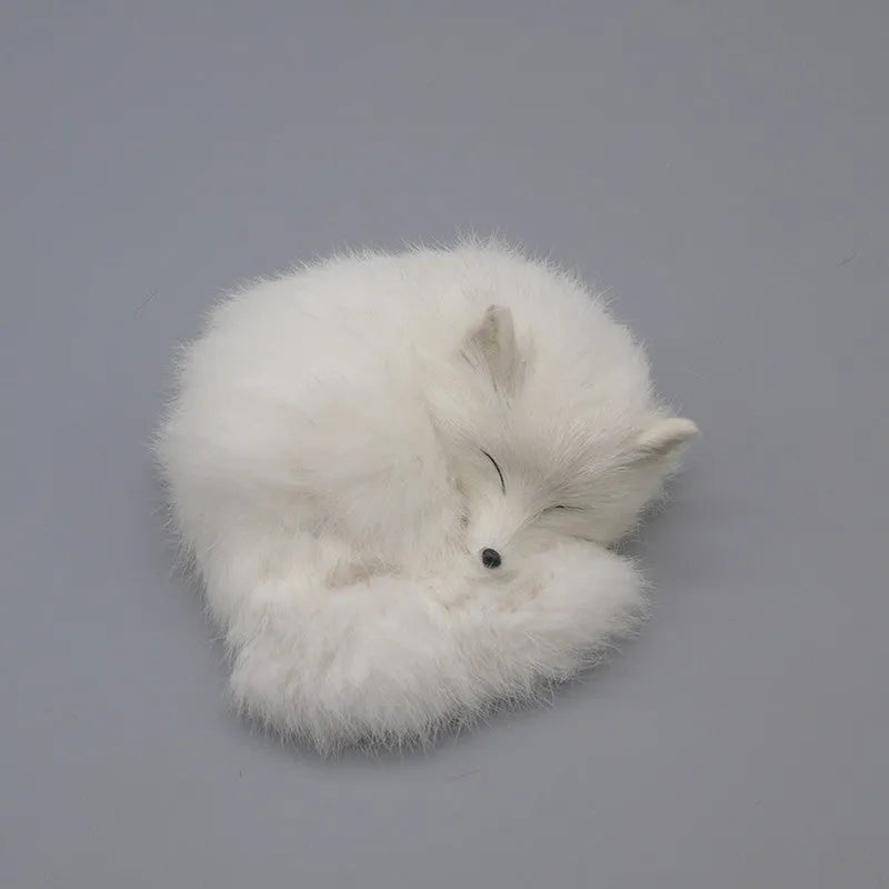 Artificial white fox fur car decoration handicraft on a dashboard.