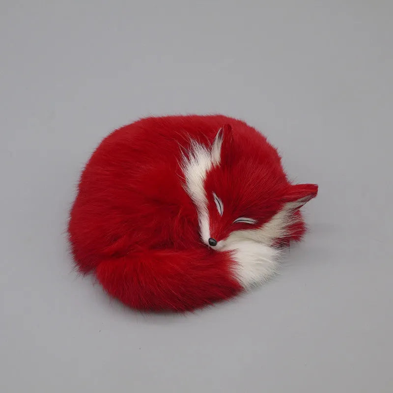 Artificial white fox fur car decoration handicraft on a dashboard.