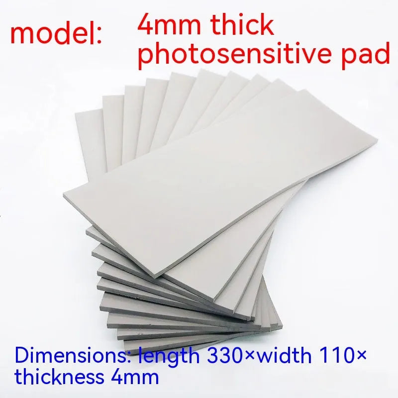 Black and grey plastic light-sensitive mat for photosensitive seals measuring 330mm by 110mm