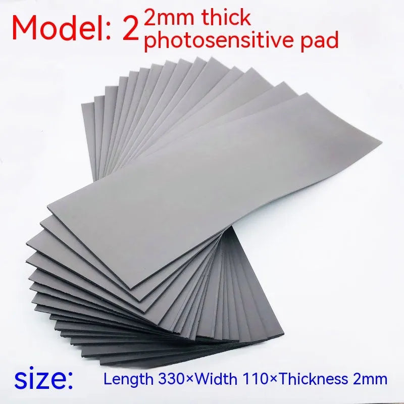 Black and grey plastic light-sensitive mat for photosensitive seals measuring 330mm by 110mm