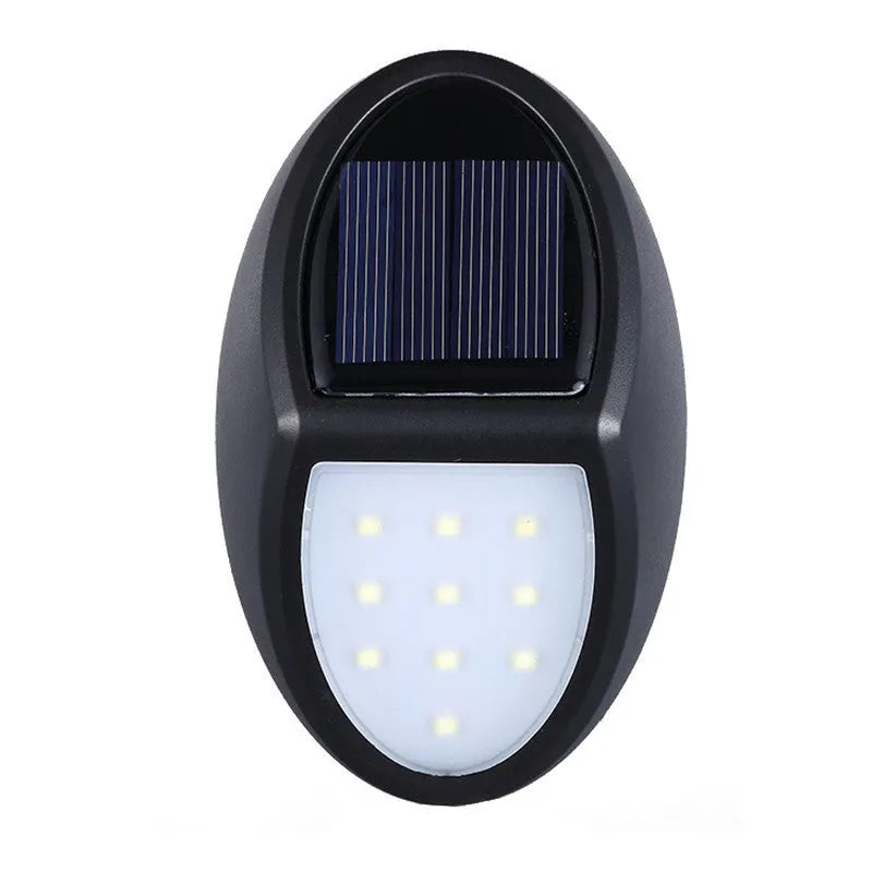 Black rectangular solar-powered LED wall light with automatic sensor for outdoor use.
