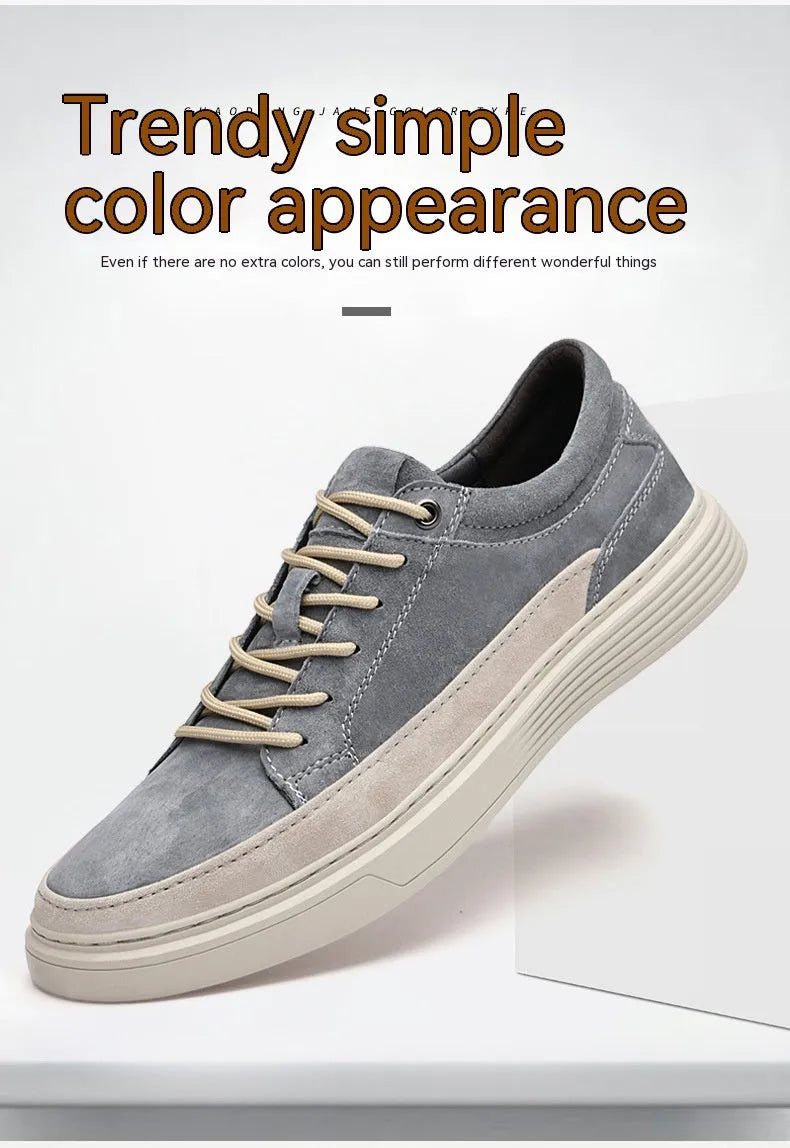 Men's grey casual skate shoes with pigskin upper and rubber sole on a white background