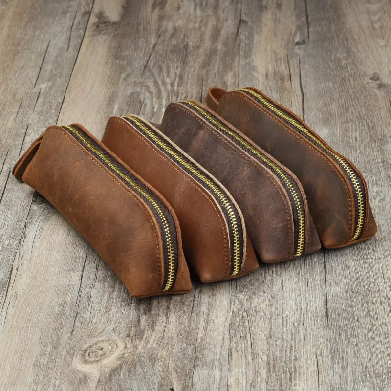 Square leather pencil case with zipper closure in black, brown, dark brown, or yellow colour