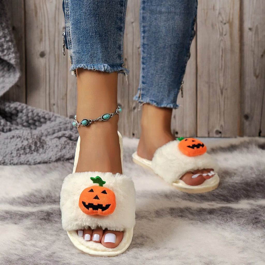 Pumpkin-themed plush slippers with synthetic fur upper and anti-slip PVC sole