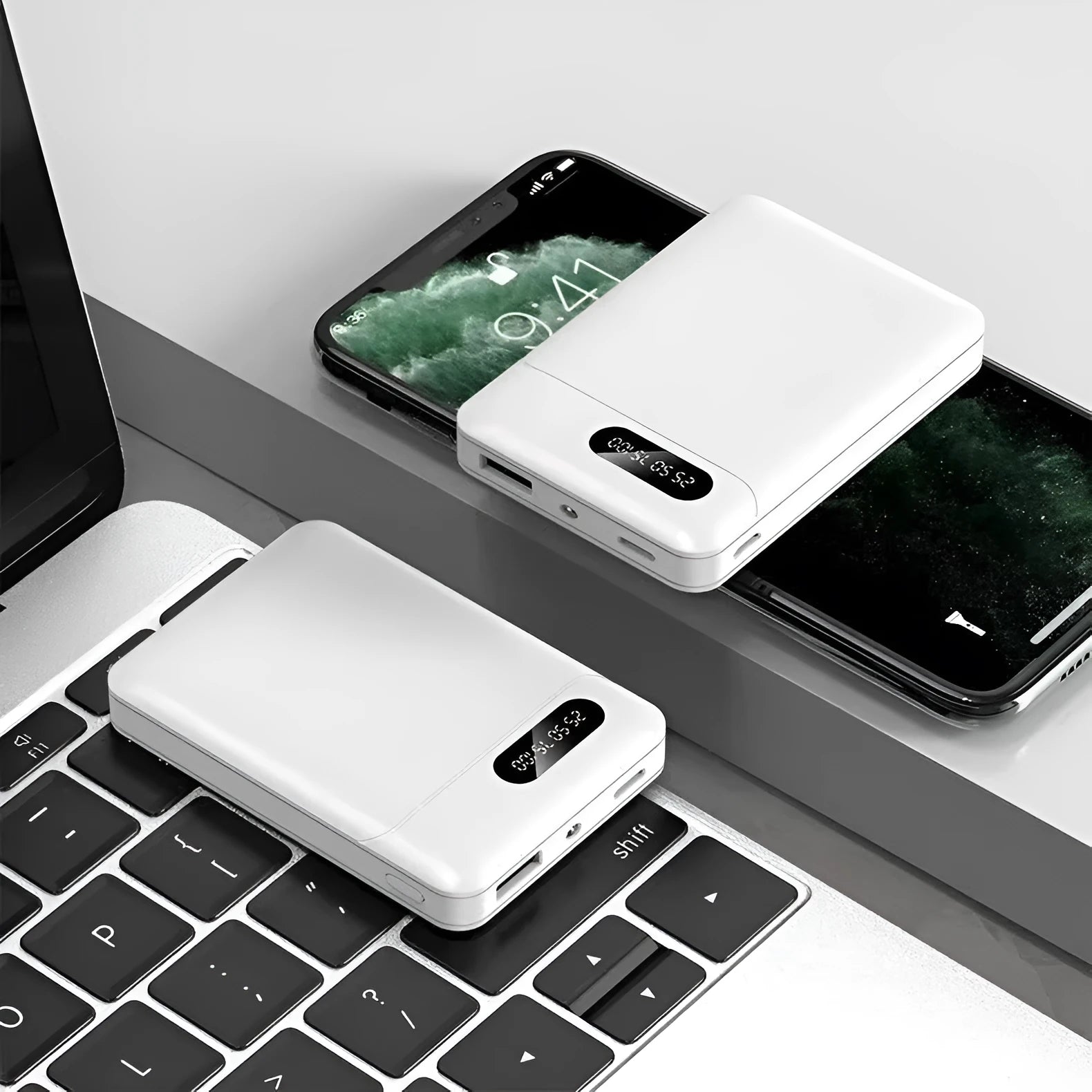 Black or white portable power bank with dual USB ports showing 10000mAh capacity label