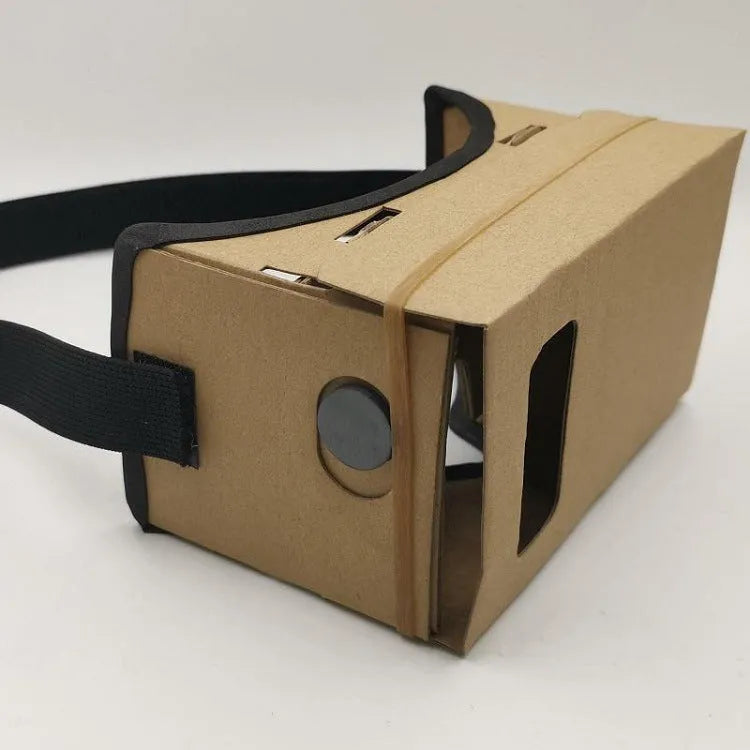 Pink and white cardboard VR headset for smartphones with adjustable strap and magnetic button.
