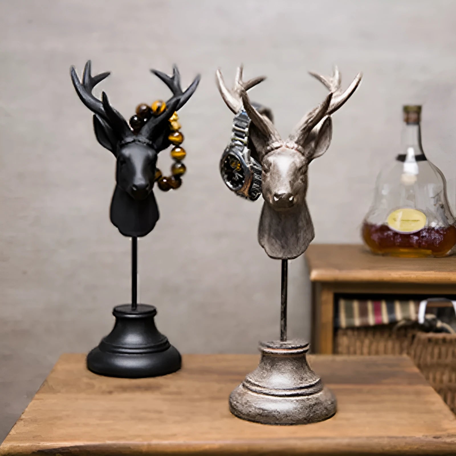 Tall black natural resin animal sculpture for home decoration on a wooden table.
