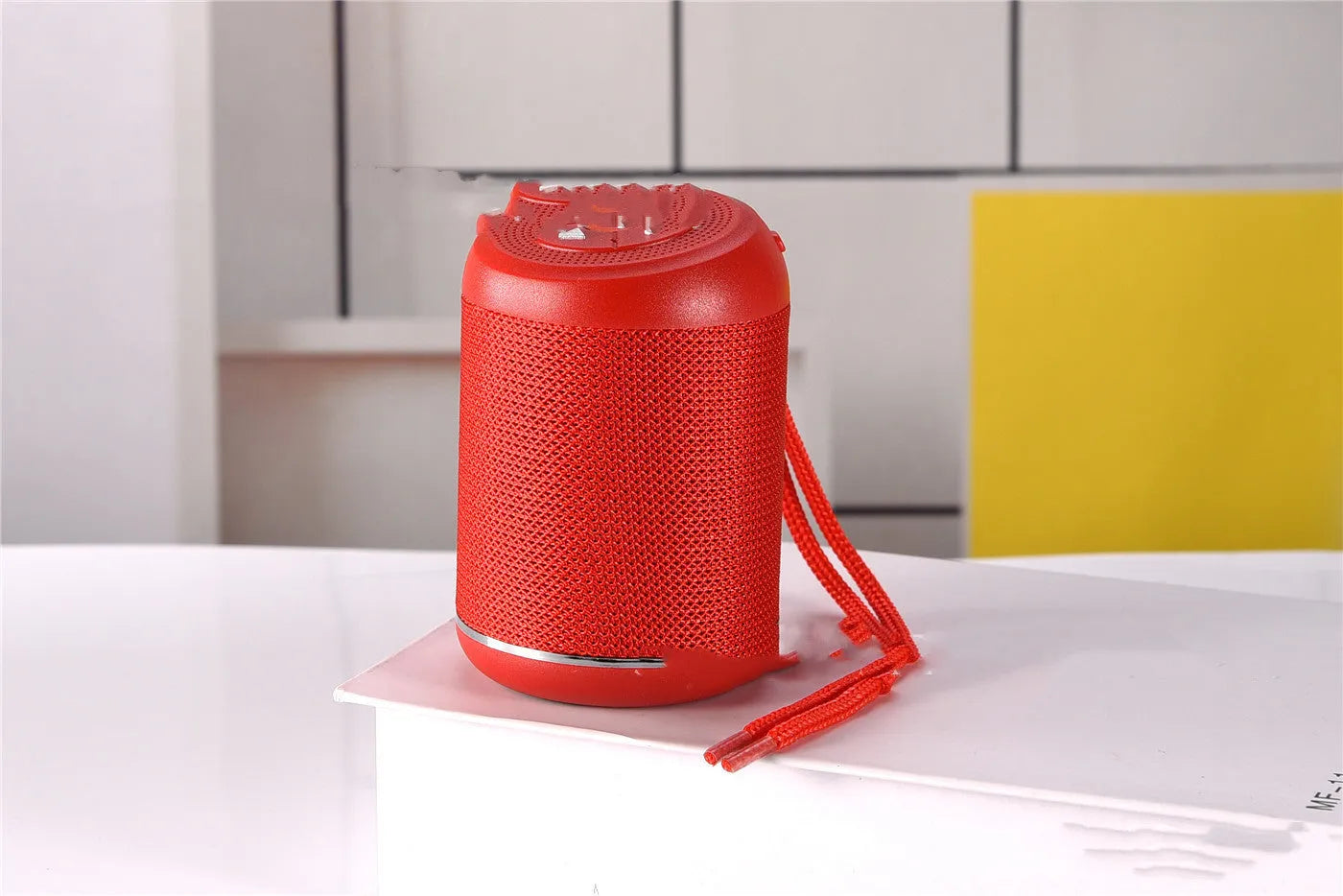 Portable outdoor Bluetooth subwoofer speaker in multiple colour options including black, blue, and camouflage.