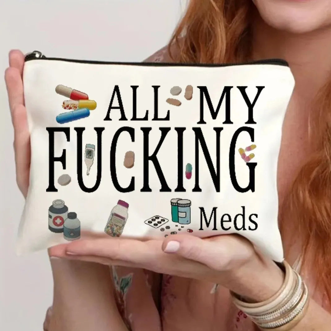 Canvas-style polyester cosmetics bag with a zipper, shown in multiple colour options.