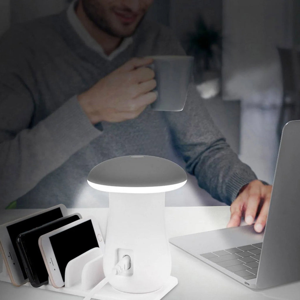 White mushroom-shaped USB charging dock with 5 ports and built-in LED night light on a desk