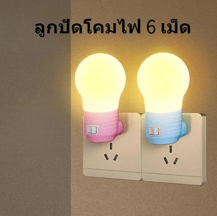 Plug-in bedside baby night light in white, blue or pink with round modern design