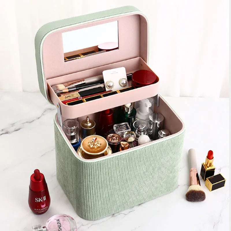 Large corduroy cosmetic storage box with solid colour exterior and polyester cotton lining.