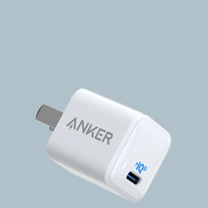 White 18W fast USB travel charger for mobile phones with UK plug